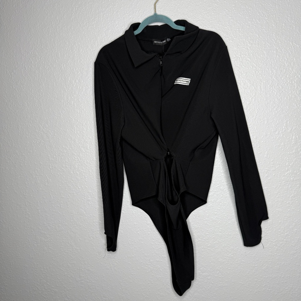 Pretty Little Thing‎ Plus Black Cut Out Zip Detail Rib Bodysuit